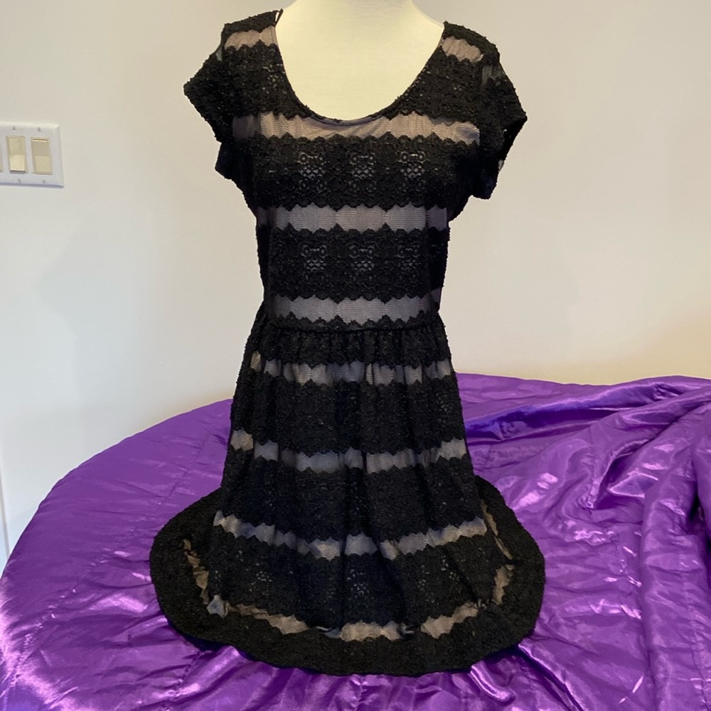 Candie’s black and lilac fully lined dress with bow accent on back